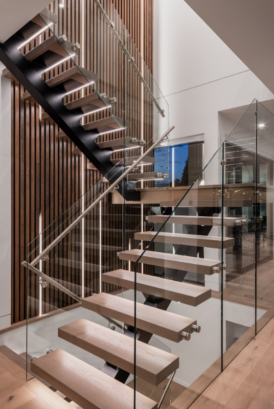 Custom CNC fabricated solid wood panels and architectural features crafted in-house.